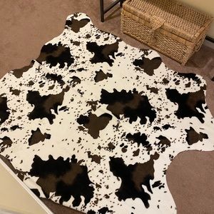 Faux cow skin accent throw rug